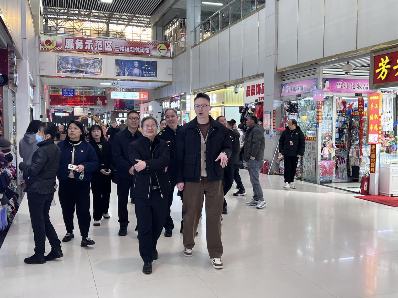 市检查组对钱江市场党建树模点建设举行验收